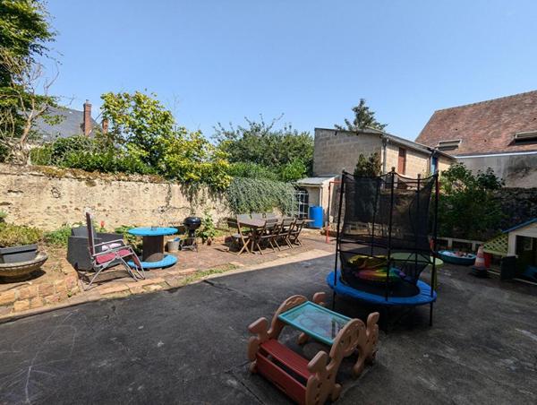 Immeuble de rapport: 2 appartements et local commercial