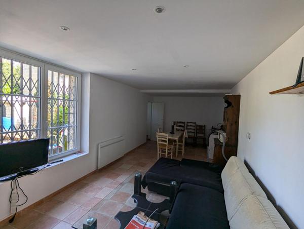 Immeuble de rapport: 2 appartements et local commercial