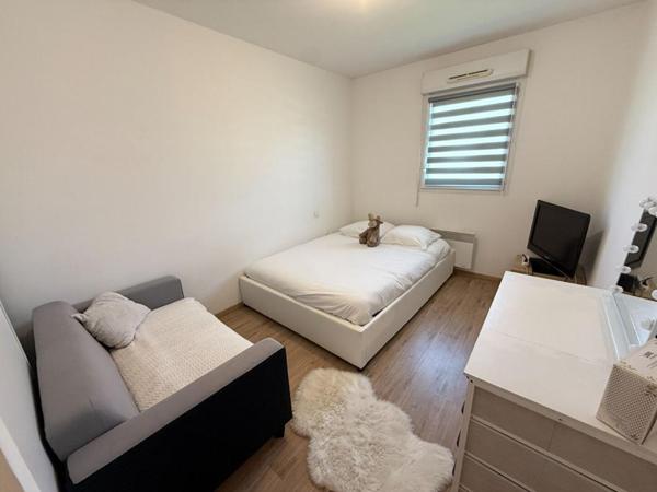 Appartement T4 de 75,36 M² avec ascenseur, balcon, 3 chambres, GARAGE et parking numéroté. VANNES quartier BEAUPRE KERSEC