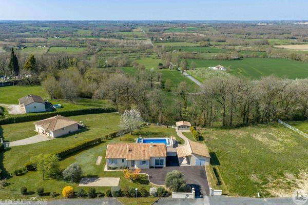 Maison de plain pied de 112m2, garage, piscine