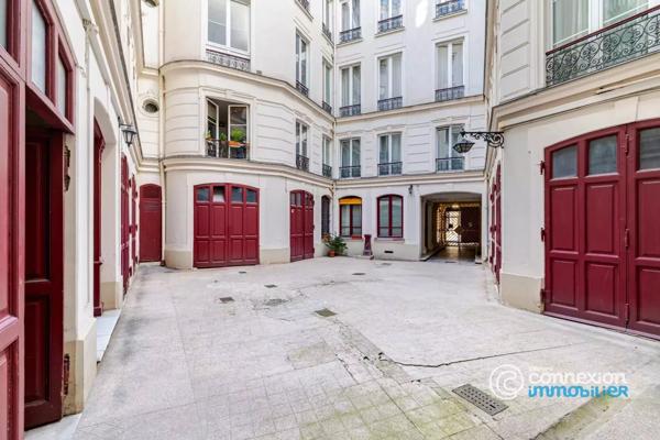 Appartement avec belle hauteur sous plafond et ascenseur