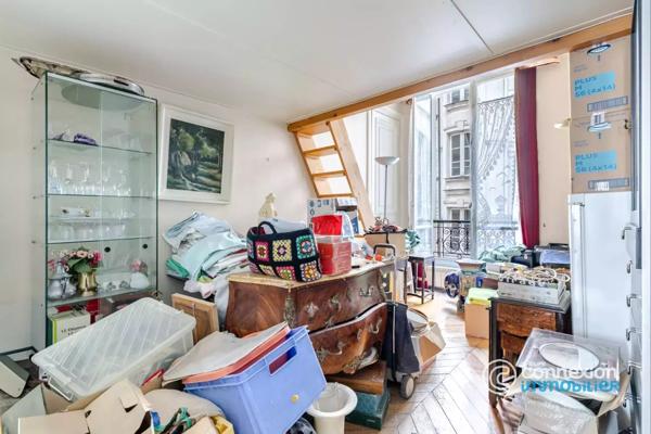 Appartement avec belle hauteur sous plafond et ascenseur