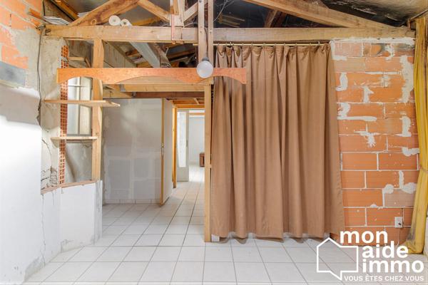 Maison et son garage + Murs commerciaux