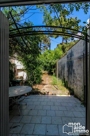 Maison et son garage + Murs commerciaux