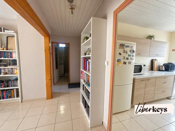 Meyzieu – Appartement 3 pièces de 56,75 m² avec balcon, cave et stationnement