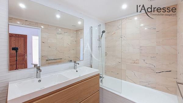 PUTEAUX/Centre ville 4/5 pièces de 97 m² avec parking boxé, 3 balcons