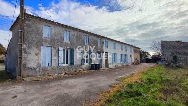 Ensemble immobilier et ses nombreuses dépendances