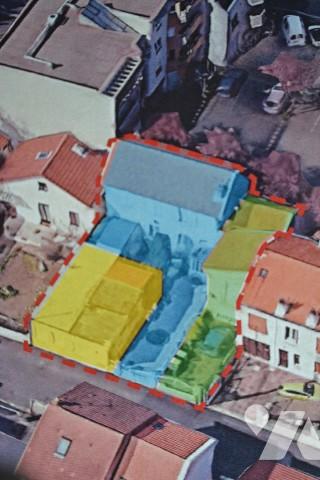 Beaumont, petit immeuble composé de 2 appartements de type 2,