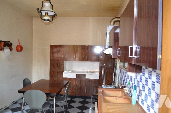 Beaumont, petit immeuble composé de 2 appartements de type 2,