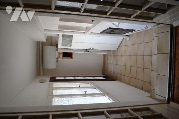 Beaumont, petit immeuble composé de 2 appartements de type 2,