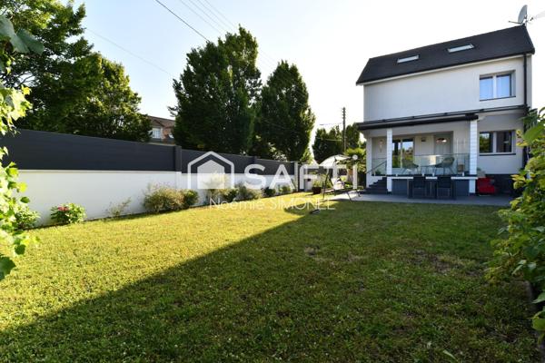 Maison familiale plus de 184 m² avec sous-sol total aménagé, système de chauffage énergie renouvelable présentant de belles prestations !!!!