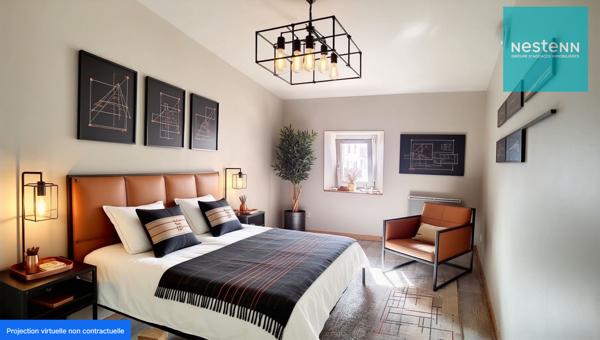 Appartement Saint Romain Le Puy - 2 chambres - centre ville - parking communal en face