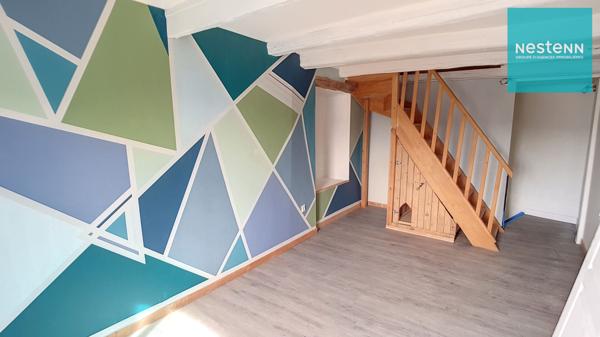 Appartement Saint Romain Le Puy - 2 chambres - centre ville - parking communal en face