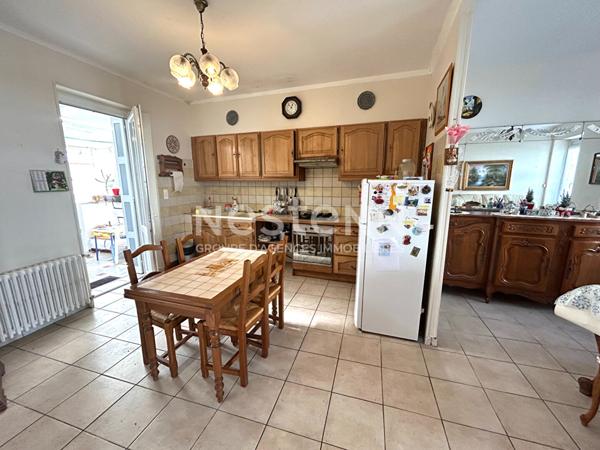 MAISON DE PLAIN PIED AVEC VERANDA ET COIN JARDIN