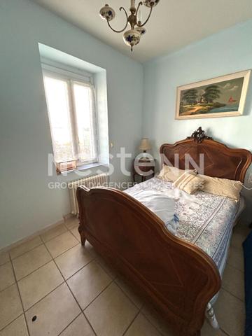 MAISON DE PLAIN PIED AVEC VERANDA ET COIN JARDIN