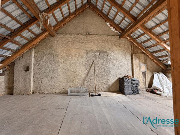 Maison mitoyenne de 91,17 m² avec jardin et dépendance
