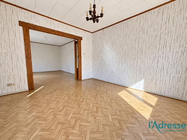 Maison mitoyenne de 91,17 m² avec jardin et dépendance