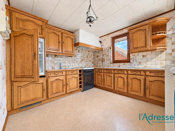 Maison mitoyenne de 91,17 m² avec jardin et dépendance