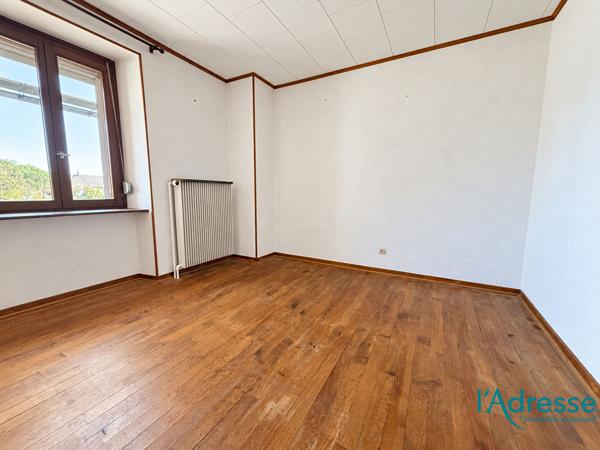 Maison mitoyenne de 91,17 m² avec jardin et dépendance