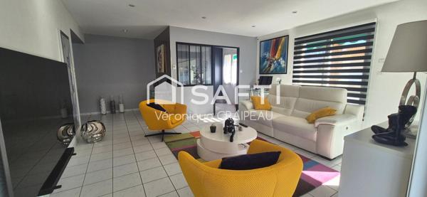 Maison aux beaux volumes sans travaux avec 3 chambres, 1 bureau, véranda avec jacuzzi et piscine chauffée, le tout sur terrain clos proche tous services.