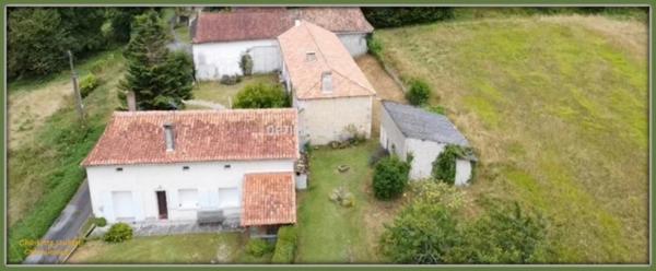 ensemble de 2 maisons en pierre + grand terrain