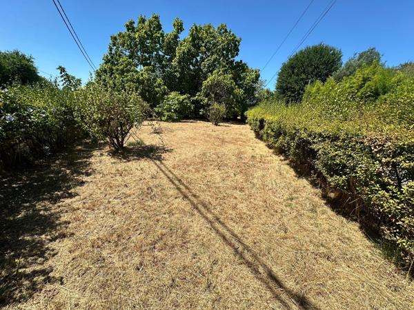 TERRAIN constructible de 1424 m2 proche centre ville