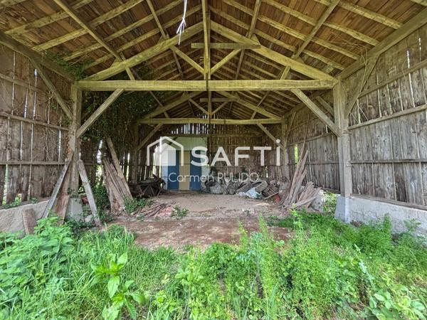 Ancien séchoir à tabac à rénover avec terrain constructible