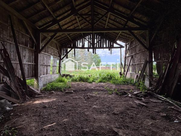 Ancien séchoir à tabac à rénover avec terrain constructible