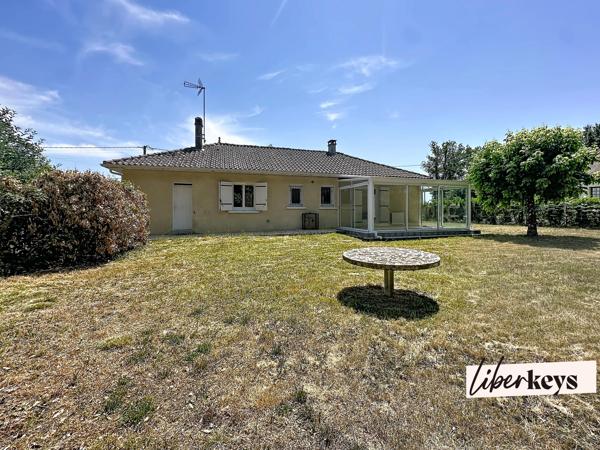 Maison de plain pied avec parc boisé