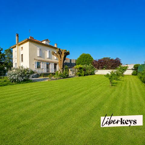 Maison de caractère avec grand jardin au cœur de Brignais