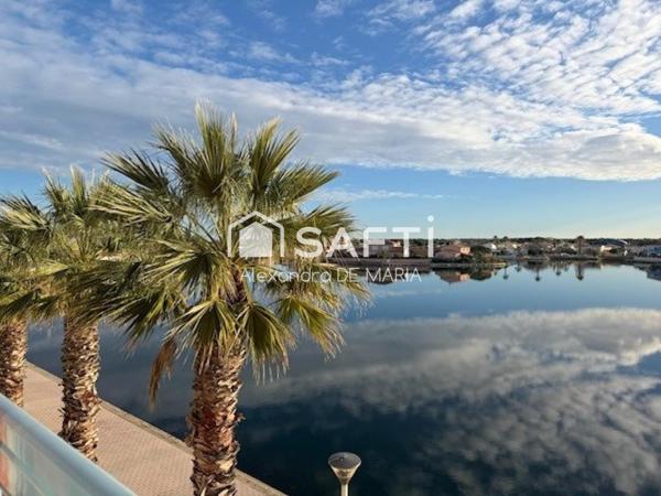 Appartement T2 avec loggia, parking et vue sur l’étang