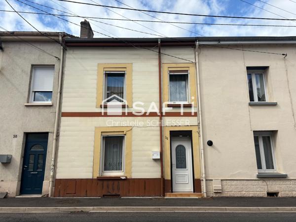 Maison mitoyenne 85 m2 avec deux chambres, agréable terrasse et jardin