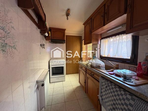 Maison mitoyenne 85 m2 avec deux chambres, agréable terrasse et jardin