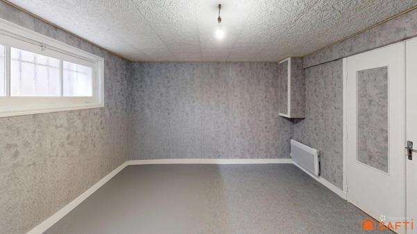 Maison sur sous sol SAINT JEAN D’ANGÉLY - CENTRE