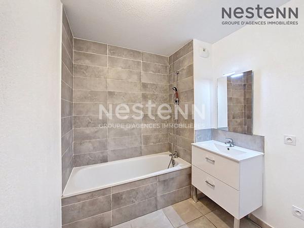 Appartement 3 pièces de 62 m2 en rez de jardin à Lunel