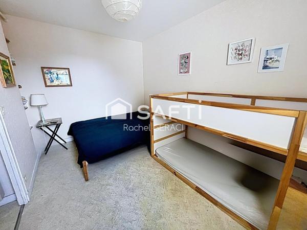 Appartement 2 pièces, balcon sud, place de parking