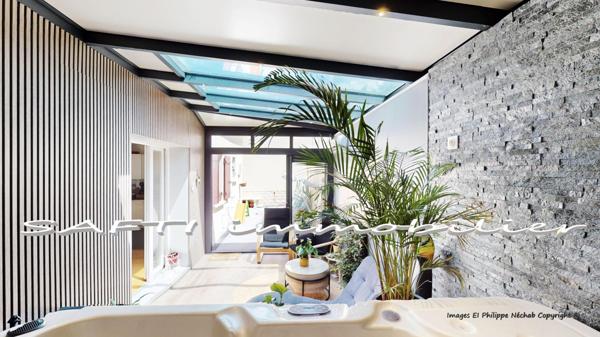 Maison contemporaine 164m2 - 5 chambres - dont un studio T2 indépendant – garage – véranda.