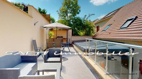 Maison contemporaine 164m2 - 5 chambres - dont un studio T2 indépendant – garage – véranda.