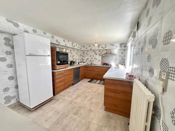 MAISON AVEC JARDIN ET GARAGE PROCHE CENTRE VILLE