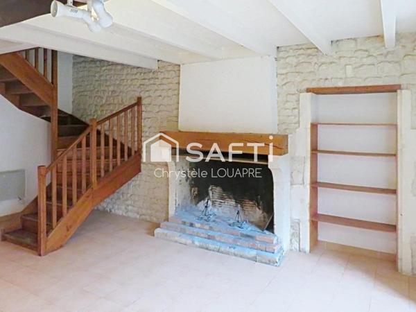 Maison divisée en 4 logements locatifs