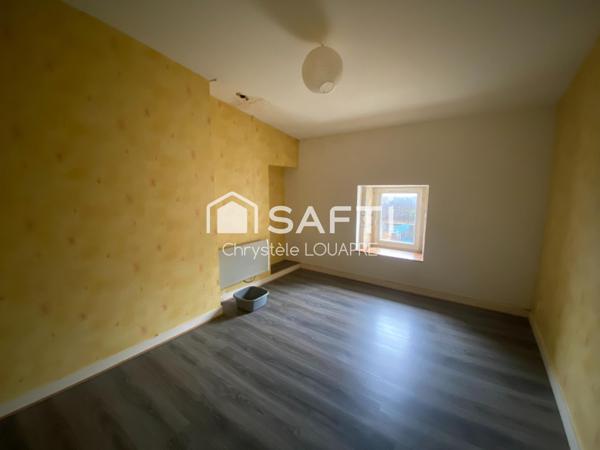 Maison divisée en 4 logements locatifs