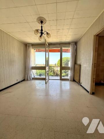 Un appartement T4 avec balcon, stationnement et cave 