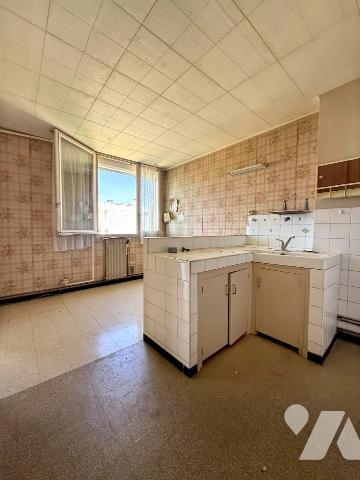 Un appartement T4 avec balcon, stationnement et cave 