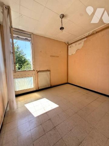 Un appartement T4 avec balcon, stationnement et cave 