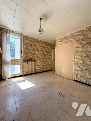 Un appartement T4 avec balcon, stationnement et cave 