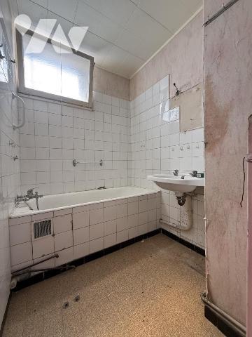 Un appartement T4 avec balcon, stationnement et cave 