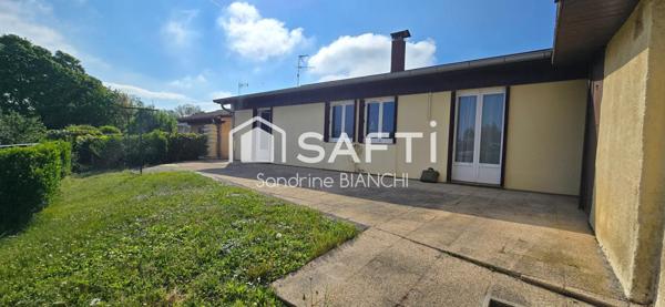 Maison individuelle de plain-pied et jardin arboré