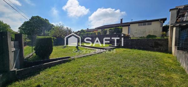 Maison individuelle de plain-pied et jardin arboré