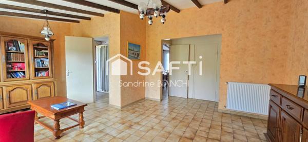 Maison individuelle de plain-pied et jardin arboré