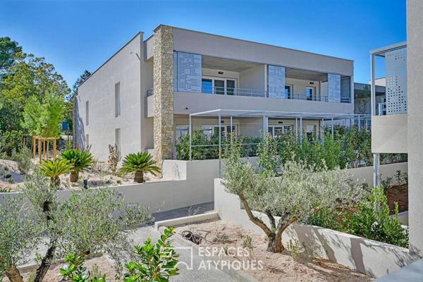 Appartement P3 avec jardin, garages et ascenseur quartier Camplanier